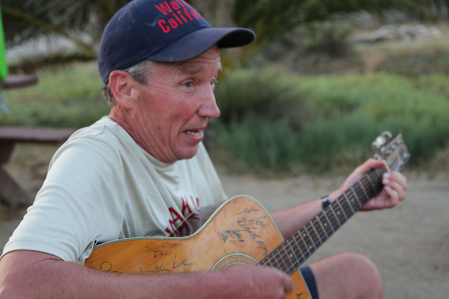 cameron mitchell photo of man playing guitar